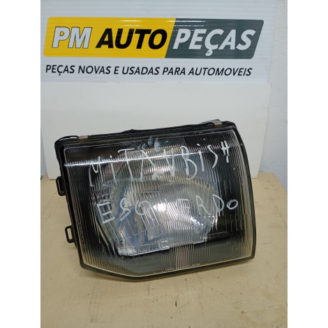 Farol Pajero Mitsubish...